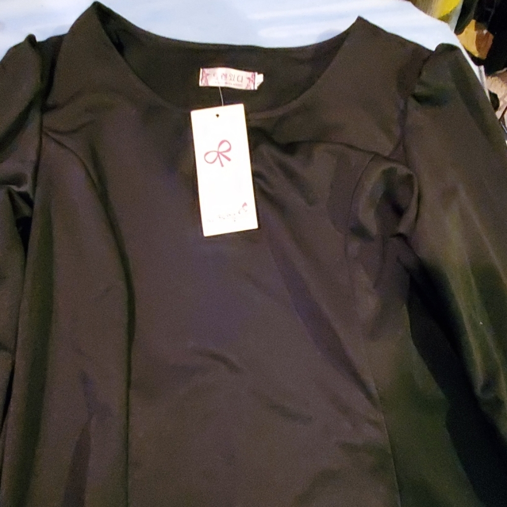 Black dress with lack trim and lace corset back